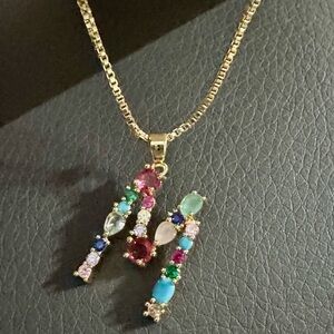 Adornia Gemstone initial M gold plated necklace.